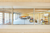 View from the cafeteria, the heart of the Werkhof, to the spacious parking lot