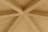 Roof soffit on cross-laminated timber with purlins converging in the center