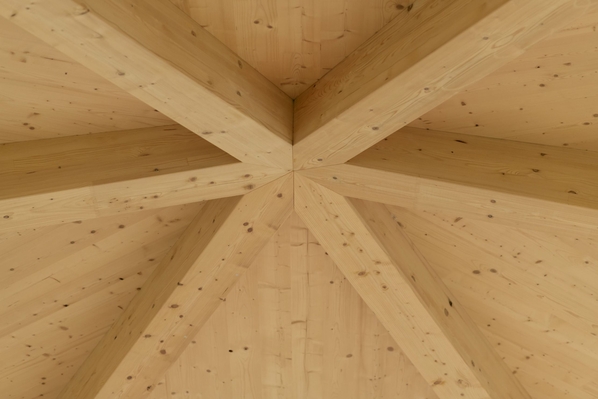 Roof soffit on cross-laminated timber with purlins converging in the center