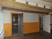 Parois en madriers faisant partie intégrante de la construction des murs extérieurs.